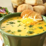 A bowl of cheese and broccoli soup